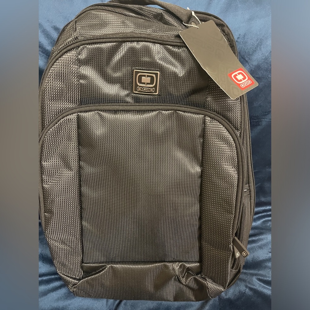 Ogio Roamer pack with lots of pockets and with laptop  compartment